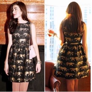 Anthro EyeDoll black gold panther flare dress